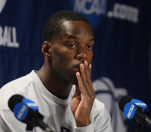 Trent Nelson  |  The Salt Lake Tribune
BYU's Charles Abouo listens to a question during a press conference as BYU prepares to face Gonzaga in the NCAA Tournament, men's college basketball in Denver, Colorado, Friday, March 18, 2011.