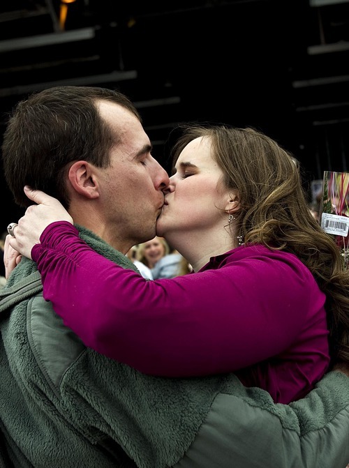 Sarah A. Miller  |  The Salt Lake Tribune

Elise Reneer of Sandy kisses her husband, Specialist Ryan Reneer, as he arrives Sunday, March 20, with other members of the Air National Guard's 144th Area Support Medical Company after a 12-month deployment to Afghanistan. They returned to the Air National Guard Base in Salt Lake City.