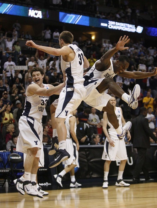 Trent Nelson  |  The Salt Lake Tribune
BYU's Jimmer Fredette, Kyle Collinsworth and Charles Abouo celebrate as BYU defeats Gonzaga in the NCAA Tournament, men's college basketball at the Pepsi Center in Denver, Colorado, Saturday, March 19, 2011, earning a trip to the Sweet 16.