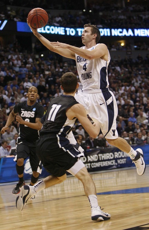 Trent Nelson  |  The Salt Lake Tribune
BYU's Jackson Emery shoots over Gonzaga's David Stockton as BYU faces Gonzaga in the NCAA Tournament, men's college basketball at the Pepsi Center in Denver, Colorado, Saturday, March 19, 2011.