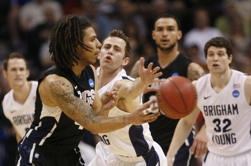 Trent Nelson  |  The Salt Lake Tribune
BYU's Jackson Emery defending Gonzaga's Steven Gray as BYU faces Gonzaga in the NCAA Tournament, men's college basketball at the Pepsi Center in Denver, Colorado, Saturday, March 19, 2011.