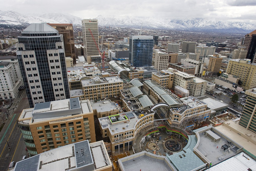 Al Hartmann   |  The Salt Lake Tribune 
A view of the City Creek Center on Monday from the 28th floor of the Promontory Condominiums on South Temple, looking east toward the Richards Court Fountain Plaza and retractable roof panels.