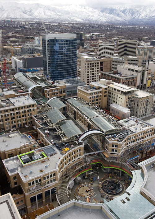 Al Hartmann   |  The Salt Lake Tribune 
Another view from View of the City Creek the 28th floor of the Promontory Condominiums on South Temple, looking east to the Richards Court Fountain Plaza and retractable roof panels.