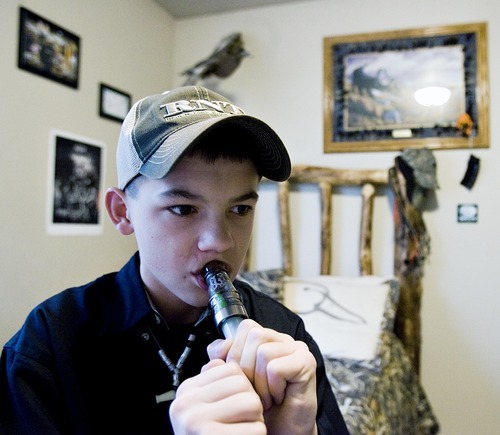 Djamila Grossman  |  The Salt Lake Tribune
Tate Douglas, 15, practices with his goose caller. Tate is entered in six different duck or goose-calling contests at the International Sportsman's Expo in Sandy.