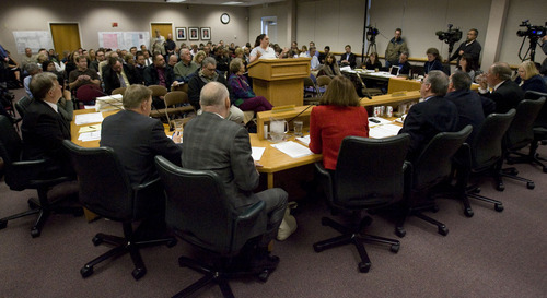 Steve Griffin  |  The Salt Lake Tribune

Members of the Utah liquor commission listen to Crystal Lammers, who is the assistant manager at the Orem liquor store, during public comment during a meeting at the Utah Department of Alcohol Beverage Control building in Salt Lake City on Thursday, March 24, 2011. The commission was taking public comment on liquor store closures in the state.