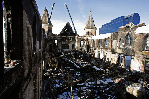 Francisco Kjolseth  |  The Salt Lake Tribune

Only a shell remains as crews begin to remove debris from the historic downtown Provo Tabernacle following the Dec. 28, 2010 fire that gutted the beloved building. A painting of Jesus had been badly scorched in the blaze -- save for Christ's image, which was left nearly untouched by the flames. Some considered this a miracle.