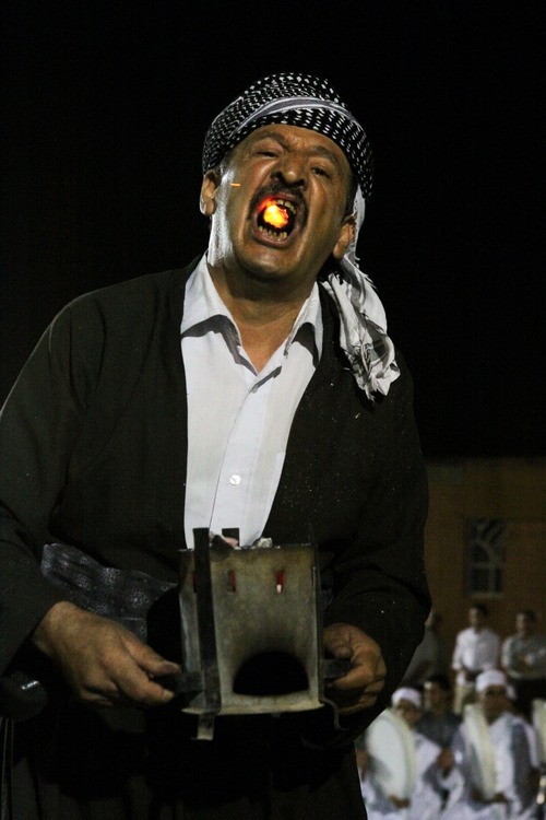 Cindy Hosea  |  Special to The Salt Lake Tribune

A Sufi man puts burning coals in his mouth to show his devotion to god during a religious ceremony in September, 2010.