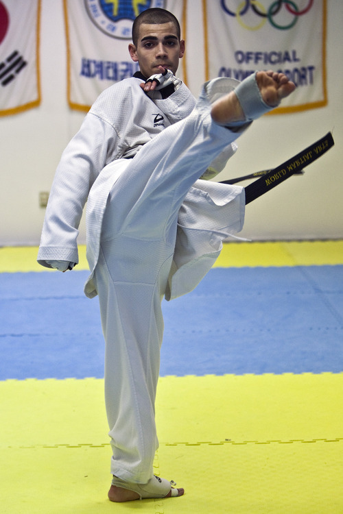 Chris Detrick | The Salt Lake Tribune 
Andres Pizarro, a senior at Juan Diego Catholic High School, is a multiple Tae Kwon Do champion. He is pictured recently at Pace Academy Tae Kwon Do.
