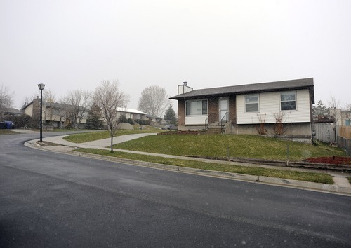 Sarah A. Miller  |  The Salt Lake Tribune

Cassandra Marie Shepard, Sherrie Lynn Beckering and Dale Robert Beckering were arrested after police found the body of 22-year-old Christina Harms at this home in Kearns.