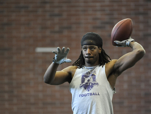 Sarah A. Miller  |  The Salt Lake Tribune

Weber State receiver Mike Phillips warms up for a drill to perform in front of NFL scouts at Pro Day on Tuesday, March 29, 2011, at the University of Utah's Spence Eccles Field House in Salt Lake City.