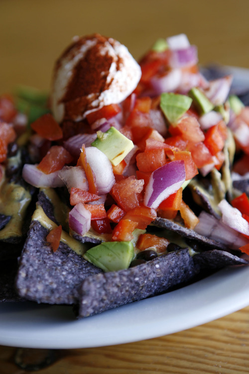 Francisco Kjolseth  |  The Salt Lake Tribune
Vegan nachos are one of the dishes available at Ginger's Garden Cafe in Springville. The mostly a vegan restaurant is located inside Dr. Christopher's Herb Shop.