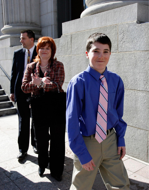 Al Hartmann  |  The Salt Lake Tribune

This photo was taken of Parker Jensen taken in 2006, as he was leaving the federal court in Salt Lake City with his mother Barbara and father Daren Parker.