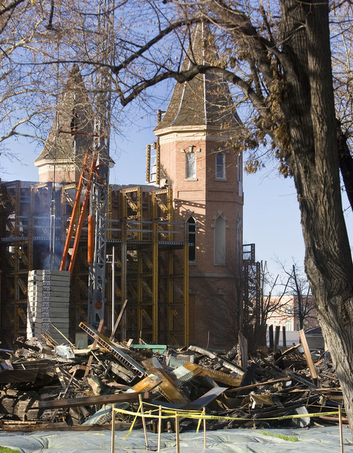 Al Hartmann   |  The Salt Lake Tribune 
Debris is stacked on the west side the Provo Taberbnacle as stabilization and cleanup work continues on the historic structure on March 31, 2011. A lighting rig and human error are being blamed for the fire that devastated the Tabernacle more than three months ago.