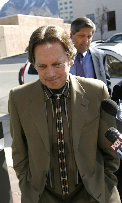 Al Hartmann   |  The Salt Lake Tribune 
Keith Brown enters court for sentencing Thursday. A judge on sentenced Brown, the father of The 5 Browns family piano performance group, to serve 10 years to life in prison for sexually abusing his daughters when they were children.