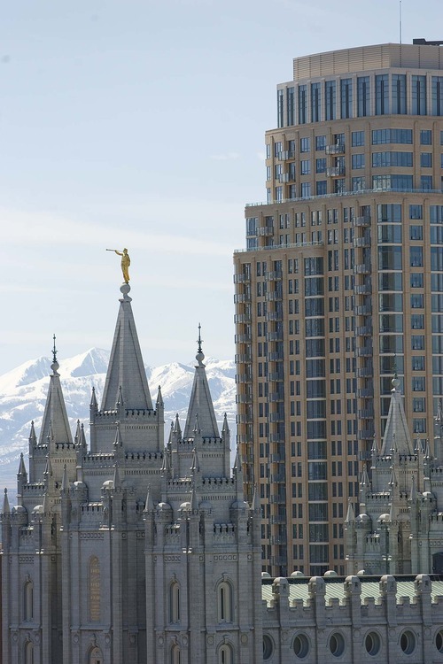 Trent Nelson  |  The Salt Lake Tribune
The Salt Lake LDS temple shares the skyline with the newly constructed Promontory Residential Tower, which is part of the new City Creek development in Salt Lake City.