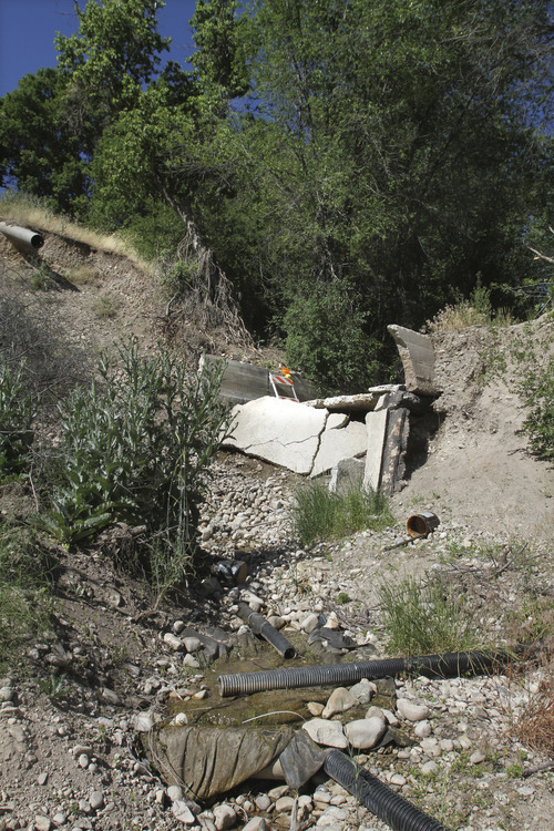 Rick Egan   |  The Salt Lake Tribune

	                                                                                                                                                                                                                                       The site of the Canal break near 900 East Canyon road, in Logan where the Canal broke a year ago, Wednesday, July 7, 2010