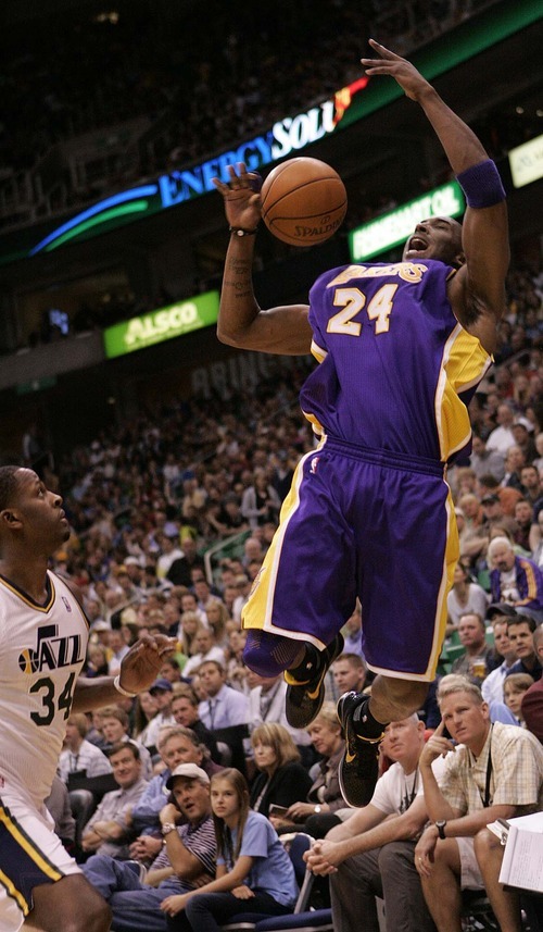 Trent Nelson  |  The Salt Lake Tribune
Los Angeles Lakers guard Kobe Bryant loses control of the ball after it was knocked away by Utah Jazz forward C.J. Miles as the Utah Jazz host the Los Angeles Lakers, NBA basketball in Salt Lake City, Utah, Friday, April 1, 2011.