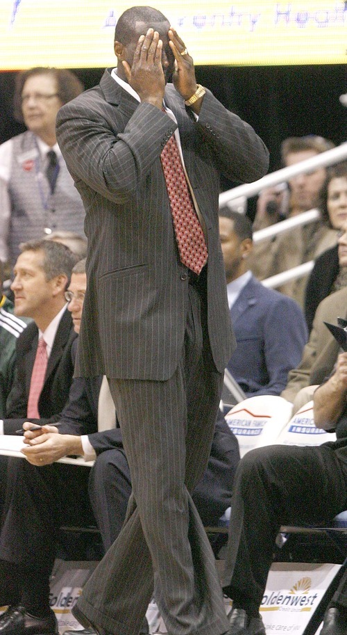 Paul Fraughton  |  The Salt Lake Tribune Jazz head coach Tyrone Corbin  covers his face in frustration as the Jazz loose in overtime to the Hornets.The Utah Jazz played the New Orleans Hornets at Energy Solutions Arena  on , Thursday  March 24, 2011