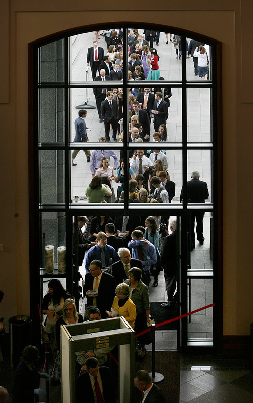 Scott Sommerdorf  |  The Salt Lake Tribune
Conference attendees stand in line to enter the Conference Center for the 181st Annual LDS General Conference, Saturday, April 2nd, 2011.
