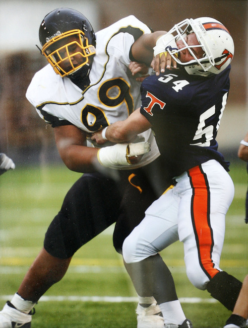 Scott Sommerdorf  |  The Salt Lake Tribune
Simi Fili, left, a star defensive lineman at Cottonwood High in 2007, was a hot prospect for many, including the Tongan Crip Gang.