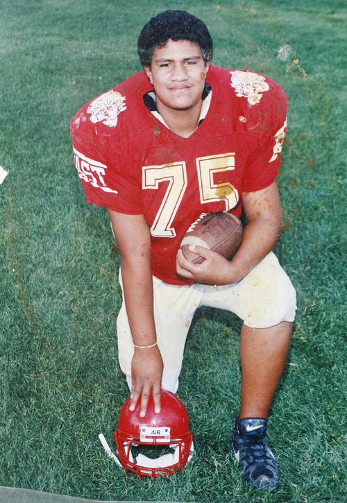 Scott Sommerdorf  |  The Salt Lake Tribune
Simi Fili, when he was playing with the East Leopards Little League football team in 2000. Fili, once a promising football star with a full-ride to Oregon, has spent his life trying to avoid the influence of the violent Glendale gang his uncle Miles Kinikini built -- the Tongan Crip Gang. 
Photo copied from his mother Le'o Fili's photo album, March 11, 2011.