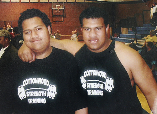 Scott Sommerdorf  |  The Salt Lake Tribune
Simi Fili (right) with his brother Viliami Fili at a weightlifting event at Cottonwood High. Simi Fili, once a promising football star with a full-ride to Oregon, has spent his life trying to avoid the influence of the violent Glendale gang his uncle Miles Kinikini built -- the Tongan Crip Gang. Photo copied from his mother Le'o Fili's photo album, March 11, 2011.