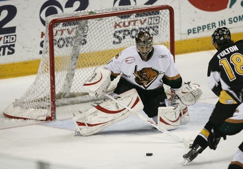 Steve Griffin  |  The Salt Lake Tribune
 
Grizzlies goalie John-Phillippe Lamoureux slides into position as he stops a shot during playoff game between the Utah Grizzlies and the Stockton Thunder at the Maverik Center in West Valley City, Utah Tuesday, April 5, 2011.