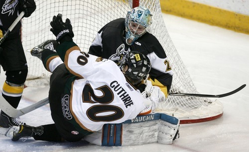 Steve Griffin  |  The Salt Lake Tribune
 
Grizzlies Shea Guthrie crashes into Stockton goalie Tyson Sexsmith drawing a penalty during third period of playoff game between the Utah Grizzlies and the Stockton Thunder at the Maverik Center in West Valley City, Utah Tuesday, April 5, 2011.