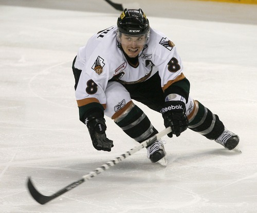 Steve Griffin  |  The Salt Lake Tribune
 
Grizzlies center Marcus Carroll deflects a shot during third period of playoff game between the Utah Grizzlies and the Stockton Thunder at the Maverik Center in West Valley City, Utah Tuesday, April 5, 2011.