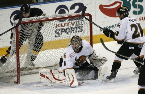 Steve Griffin  |  The Salt Lake Tribune
 
Grizzlies goalie John-Phillippe Lamoureux deflects a shot during playoff game between the Utah Grizzlies and the Stockton Thunder at the Maverik Center in West Valley City, Utah Tuesday, April 5, 2011.
