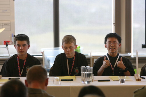 Leah Hogsten  |  The Salt Lake Tribune
Ayden Olsen, left, Salem Karren and Anthony Cheng, giving his parents a thumbs up after giving correct answers, compete in the 2011 National Geographic Bee at Lehi's Thanksgiving Point. Cheng won his second-straight state title and will represent Utah at the national bee in May.