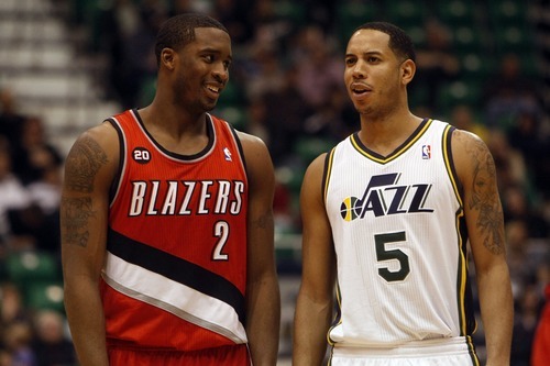 Photo by Chris Detrick | The Salt Lake Tribune 
Portland Trail Blazers guard Wesley Matthews (2) and Utah Jazz point guard Devin Harris (5) during the fourth quarter of the game at EnergySolutions Arena Thursday April 7, 2011.  Portland won the game 98-87.