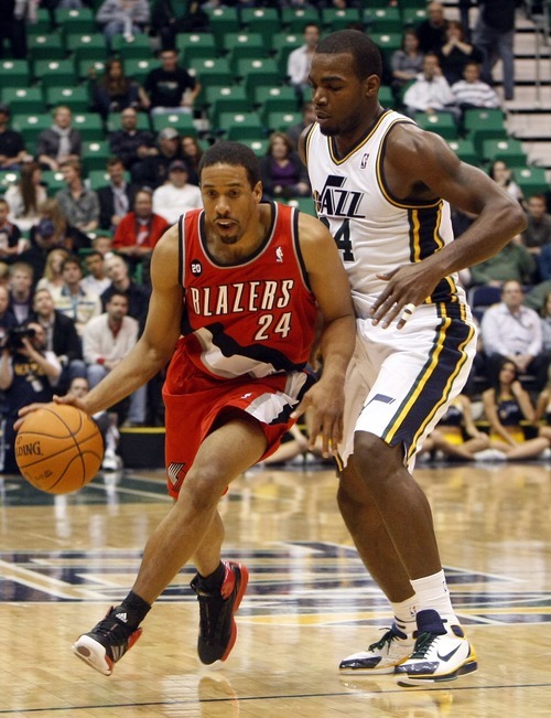 Photo by Chris Detrick | The Salt Lake Tribune 
Portland Trail Blazers point guard Andre Miller (24) runs around Utah Jazz power forward Paul Millsap (24) during the fourth quarter of the game at EnergySolutions Arena Thursday April 7, 2011.  Portland won the game 98-87.