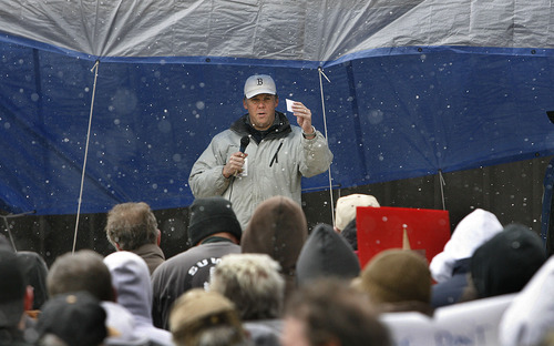 Scott Sommerdorf  |  The Salt Lake Tribune
County commisioner Phil Lyman speaks to the SPEAR members rallying in a snowstorm at the BLM headquarters in Monticello to keep trails open (and for reopening an illegal one that riders built in Recapture Canyon near Blanding). Also, Great Old Broads for Wilderness were there with a counter protest, Saturday, April 9, 2011 in Monticello, Utah.