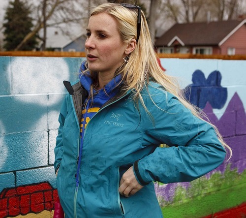 Trent Nelson  |  The Salt Lake Tribune
Jessi Cummings, a school teacher who lives in South Salt Lake, had a problem with gang graffiti on the wall surrounding her house. She decided to have some of her students at Taylorsville High paint over the graffiti with a mural of world religions. The mural has helped curb the graffiti problem on her wall.