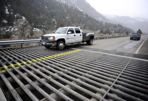 Sarah A. Miller  |  The Salt Lake Tribune

A truck drives over a newly installed cattle guard on Highway 89 at Yankee Jim Canyon, just north of Yellowstone National Park in Montana. The area just north of Yellowstone, including Gardiner and Corwin Springs, is one of the few places in North America where humans may come in contact with a free-ranging wild bison herd.