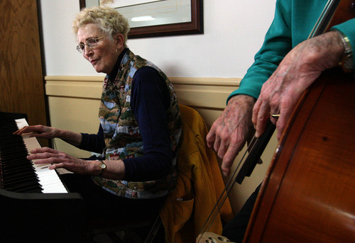 Leah Hogsten  |  The Salt Lake Tribune
Golden Years Jazz Band pianist Carol Jeppson plays alongside bassist Grant Morris at Sante Assisted Living in Bountiful.