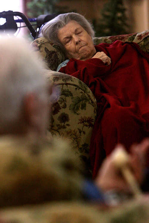 Leah Hogsten  |  The Salt Lake Tribune
Some in attendance enjoying the show at Sante Assisted Living play percussion instruments and some like Ruby Essex find time to catnap. The Golden Years Jazz Band plays every Friday at a different Bountiful care center.