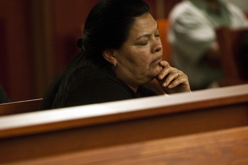 Photo by Chris Detrick | The Salt Lake Tribune 
Rosa Hernandez, mother of Faviola Hernandez, listens during the sentencing at the Scott M. Matheson Courthouse Tuesday April 12, 2011.  The man who shot and killed 24-year-old Faviola Hernandez during a botched robbery at her Glendale hair salon in 2007 was sentenced to prison Tuesday for life without parole. Miguel Mateos-Martinez, 23, was convicted by a 3rd District Court jury in February of one count of aggravated murder, two counts of aggravated robbery and two counts of aggravated assault.