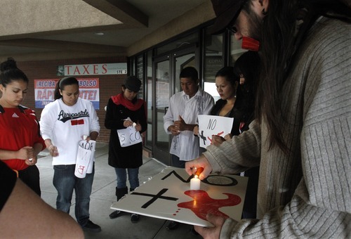 Rick Egan   |  The Salt Lake Tribune

Demonstrators gather for a moment of silence Wednesday outside of the Mexican consulate in Salt Lake City to show solidarity with the victims of the drug war in Mexico.