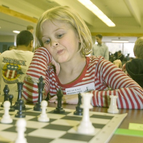 Paul Fraughton  |  The Salt Lake Tribune.
Jozette Green, a third grader at Hillsdale Elementary contemplates her next move at  West Valley City's first annual chess tournament at West Lake Junior High.
