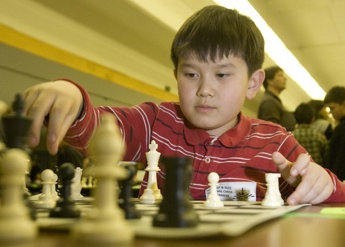 Paul Fraughton  |  The Salt Lake Tribune
Kenny Tran, a second grader at Hillsdale Elementary playing in  West Valley City's first annual chess tournament at West Lake Junior High.