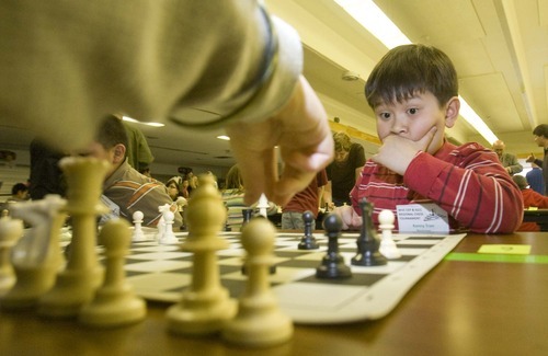Paul Fraughton  |  The Salt Lake Tribune.Kenny Tran looks concerned as he watches the move of his competitor at  at  West Valley City's first annual chess tournament at West Lake Junior High on , Friday  April 8, 2011