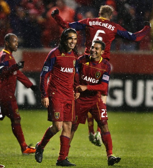 Steve Griffin  |  The Salt Lake Tribune
 
Real Salt Lake players celebrate with Fabian Espindola, second from left, after he scored the winning goal in extra time in the Real Salt Lake versus Colorado Rapids at Rio Tinto Stadium in Sandy on Wednesday, April 13, 2011.