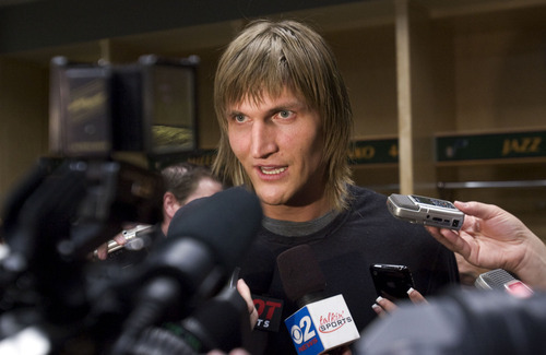 Steve Griffin  |  The Salt Lake Tribune
 
Utah Jazz forward Andrei Kirilenko talks to the media during locker clean-out day at EnergySolutions Arena in Salt Lake City on Thursday, April 14, 2011. The team finished its season last night and will not be going to the playoffs.