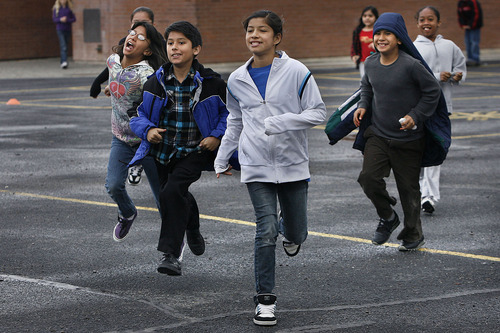 Scott Sommerdorf  |  The Salt Lake Tribune
Lincoln Elementary fourth-graders rush to get to a Playworks recess Thursday.