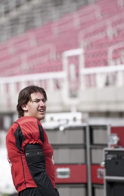 Michael Mangum  |  The Salt Lake Tribune

Utah junior quarterback Jordan Wynn watches his team from the sidelines during a spring practice session at Rice-Eccles Stadium on Monday, April 11, 2011. Wynn has had limited participation this spring due to recovery from shoulder surgery.