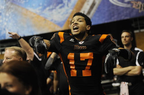 Sarah A. Miller  |  The Salt Lake Tribune

Utah Blaze's Ernie Pierce yells to a teammate on the field Friday night at Energy Solutions Arena in downtown Salt Lake City.