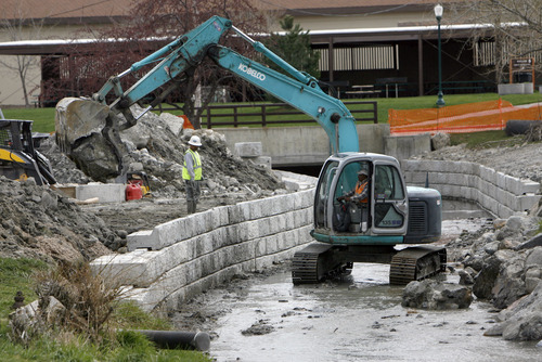 Francisco Kjolseth  |  The Salt Lake Tribune
Crews working for Salt Lake County, which has jurisdiction over Little Cottonwood Creek, shore up walls in Murray Park on Wednesday, March 13, 2011, in anticipation of possible flooding for this year's spring runoff.