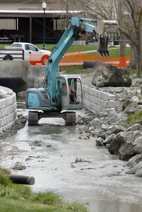 Francisco Kjolseth  |  The Salt Lake Tribune
Crews working for Salt Lake County, which has jurisdiction over Little Cottonwood Creek, shore up walls in Murray Park on Wednesday, March 13, 2011, in anticipation of possible flooding for this year's spring runoff.